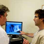 Dr. Cohen consulting with a patient